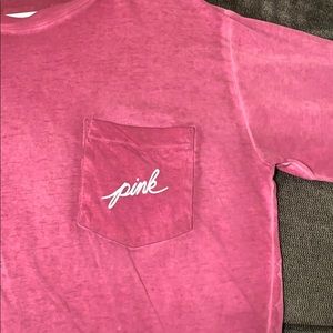 Long sleeve PINK shirt.
